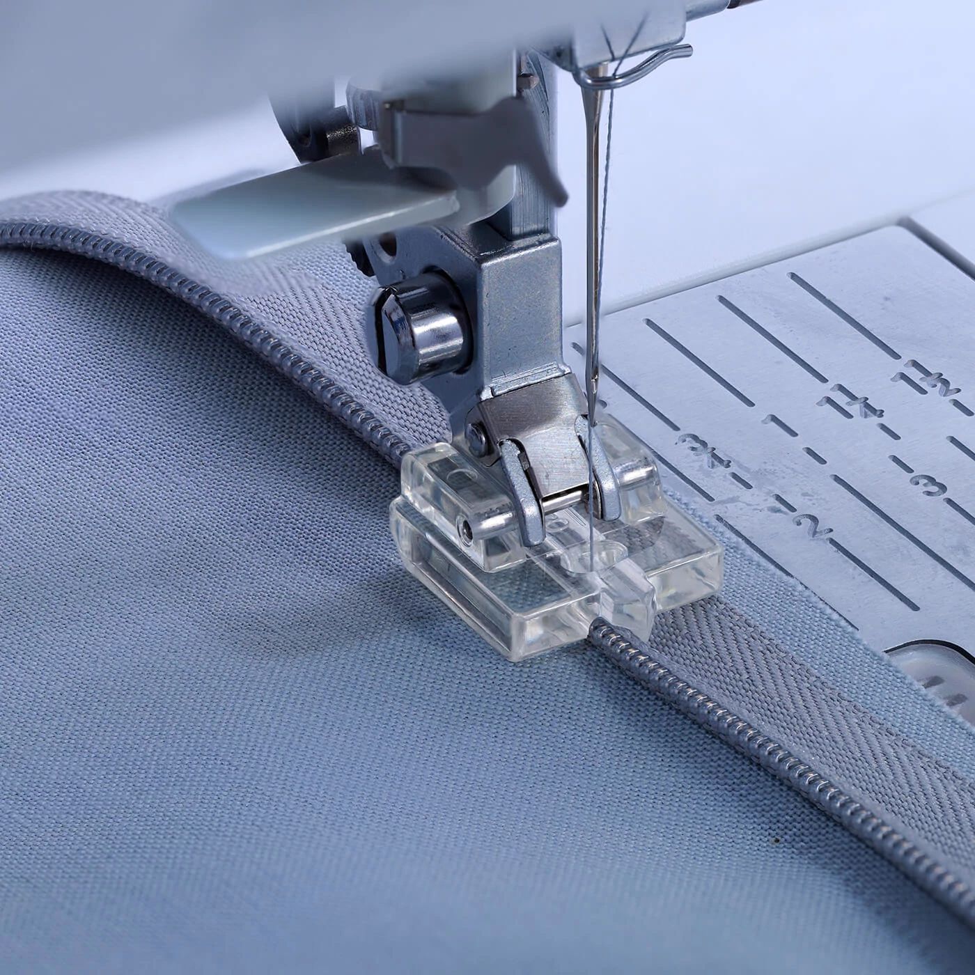The Invisible Zipper Foot sews zippers that are hidden in a seam, making  them virtually invisible. It's the perfect choice for expertly-created  garments, By Pfaff North America