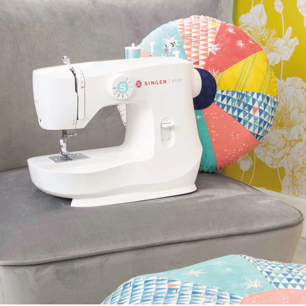 Singer M1500 Portable Sewing Machine + $65 accessories